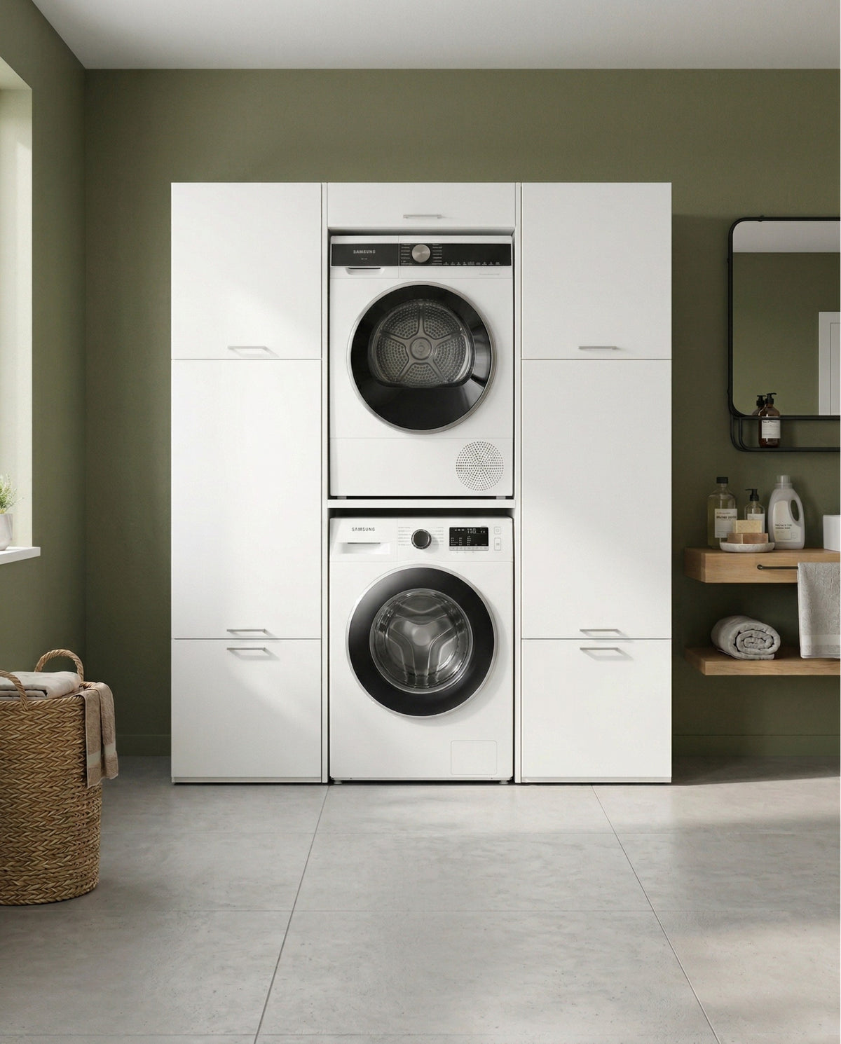 White laundry cabinet with stacked front-load washer and dryer, six storage compartments, green wall background.